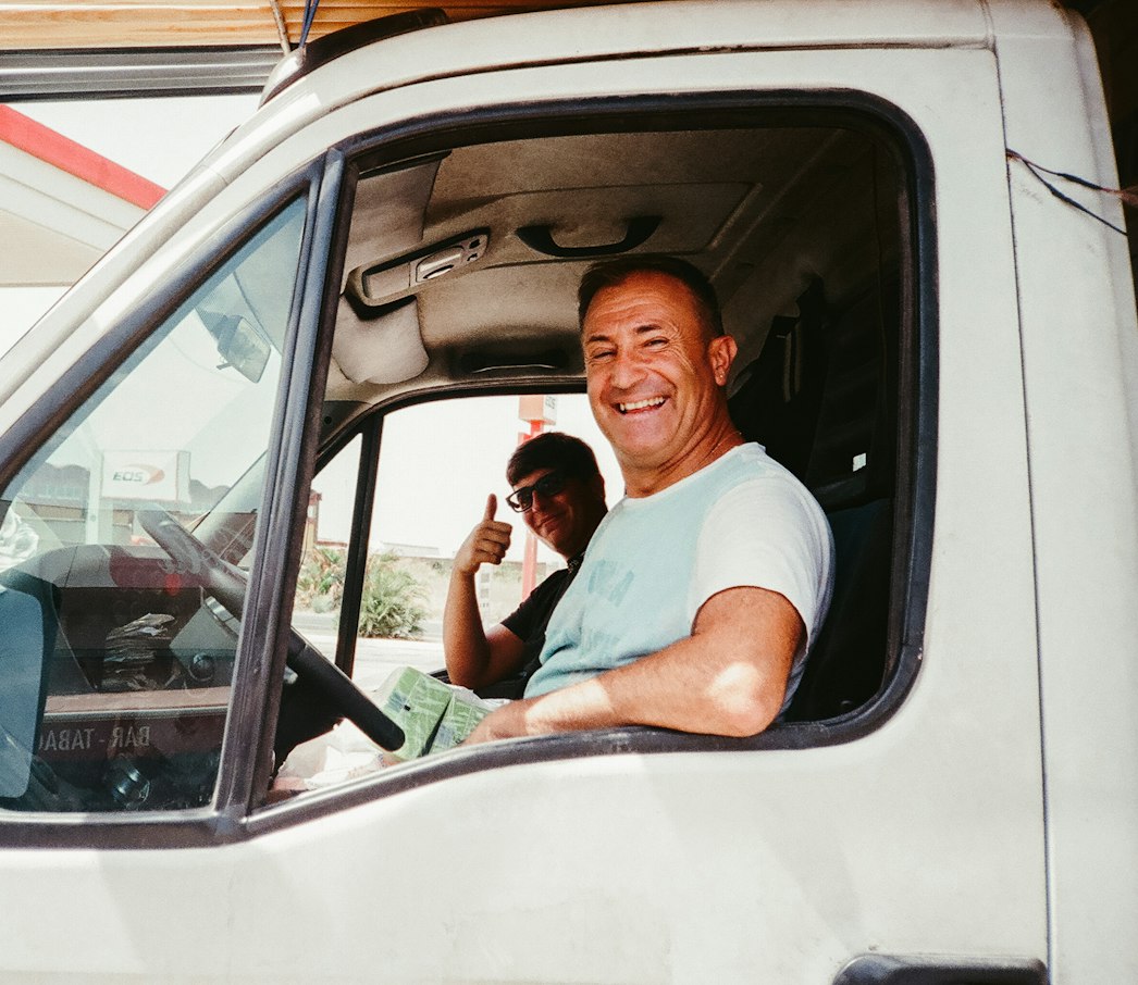 Happy driver gives a thumbs up